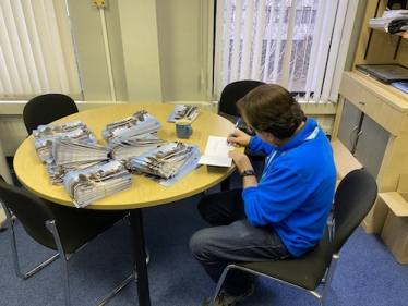 Paul signing Christmas Cards